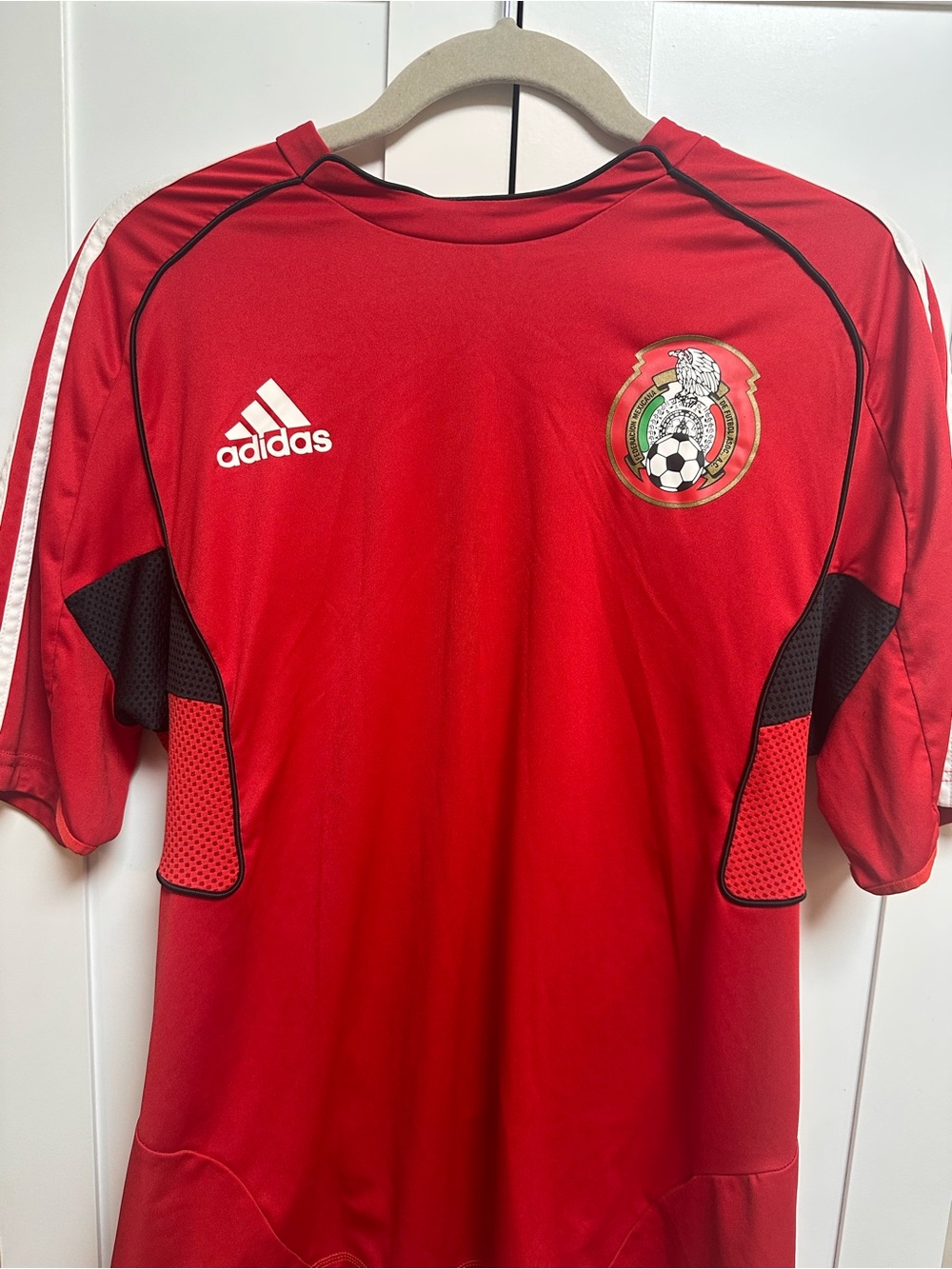 adidas MenRed Soccer Jersey with Crest and White Stripes